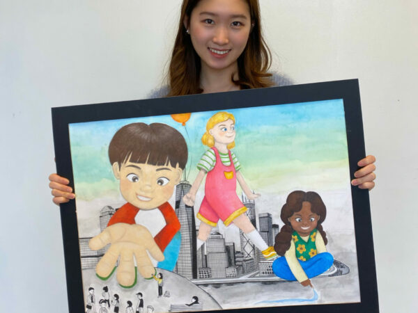 Female holding artwork